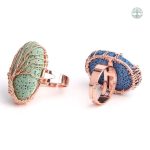 Bague en cuivre avec motif d'arbre de vie et pierres bleues