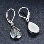 Accessoire en opale blanche, motif arbre de vie