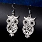 Boucles d'oreilles argentées inspirées de l'arbre de vie et de la chouette