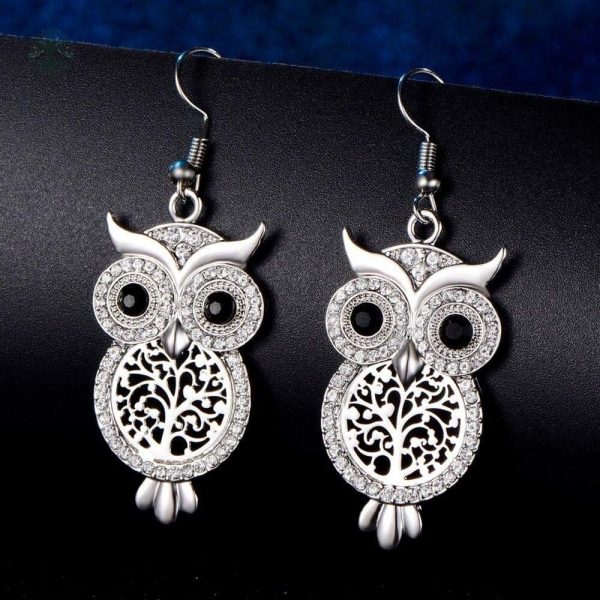 Boucles d'oreilles argentées inspirées de l'arbre de vie et de la chouette