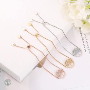 Accessoire de mode argenté, représentant l'Arbre de Vie, signification spirituelle