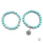 Bijou en pierre turquoise représentant un arbre de vie