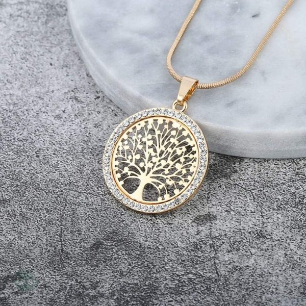 Bijou Arbre de Vie doré, symbole de connexion et de vie