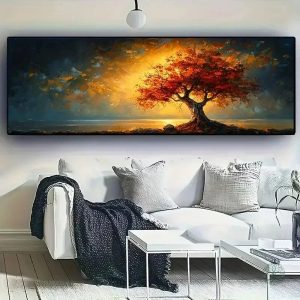 Toile Arbre rouge sous un ciel doré dramatique
